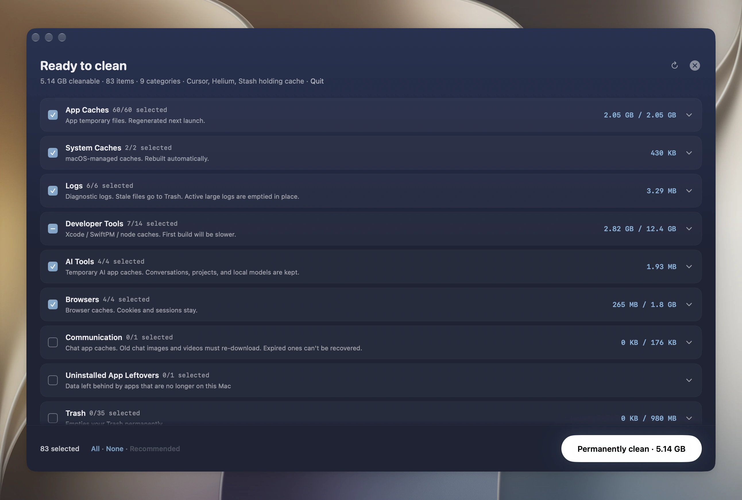 Mole's Clean review listing cache categories with their sizes, each with a checkbox, and a Permanently clean button for the 5.14 GB selected.